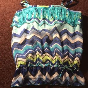 A blue, green, white, and black tank top